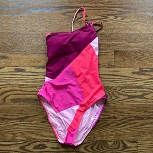 Multicolor pink, one shoulder, women’s swim suit, size 4.